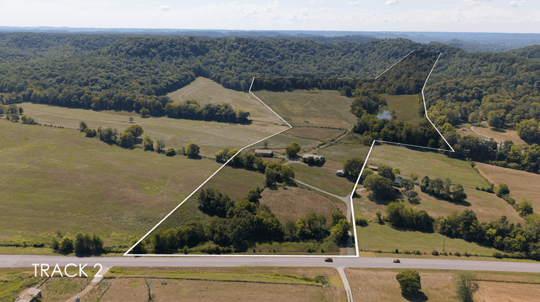 55.4 +/- Acres with 2 Barns