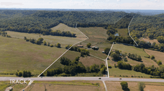 55.4 +/- Acres with 2 Barns