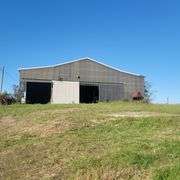 The Eugene & Roberta Hourigan Estate - Former Tractor Dealership Property - Gravel Switch KY