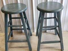 Green wooden stools