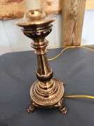 Candlestick style brass lamp with shade