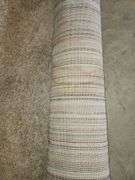 Light colored area rug