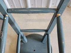 Green wooden stools