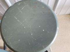 Green wooden stools