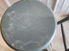 Green wooden stools