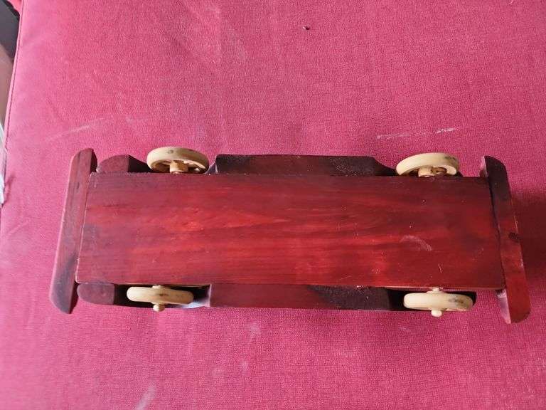 vintage handcrafted two-toned wooden antique classic car