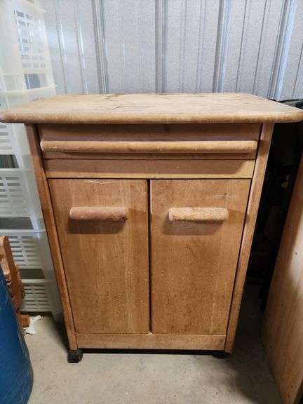 wood rolling kitchen cart with a butcher block and more