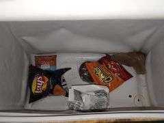 Coleman cooler & roll of paper