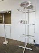 WHITE METAL SIGN RACK - Bentley & Associates, LLC