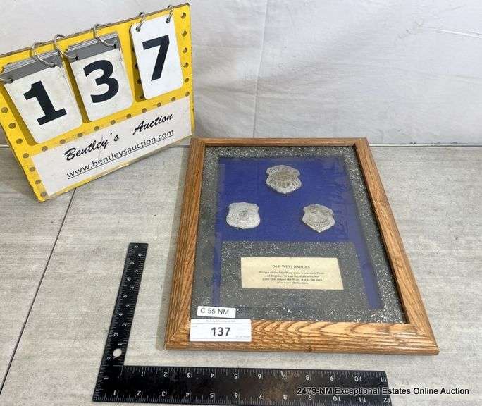 FRAME W/ VINTAGE OLD WEST BADGES - Bentley & Associates, LLC