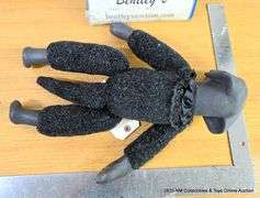 VINTAGE PORCELAIN DOLL: DOG