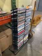 (80): DVD RACK CONTAINING 80 DVD'S ACTION/HORROR/COMEDY
