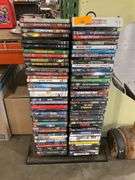 (80): DVD RACK CONTAINING 80 DVD'S ACTION/HORROR/COMEDY