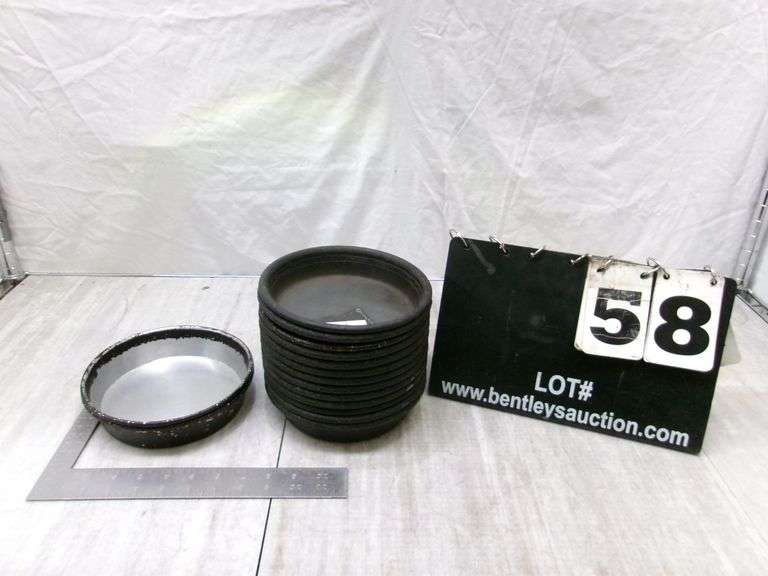 STACK OF SMALL STOVE DRUM COVERS