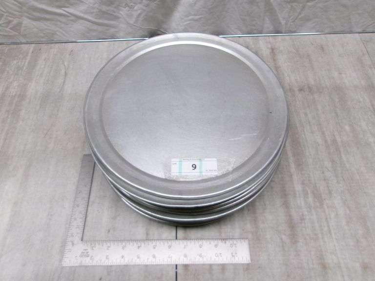 STACK OF SILVER PIZZA PANS QTY 24