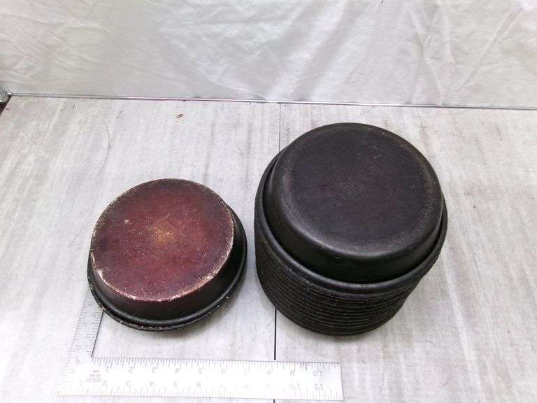 STACK OF SMALL STOVE DRUM COVERS