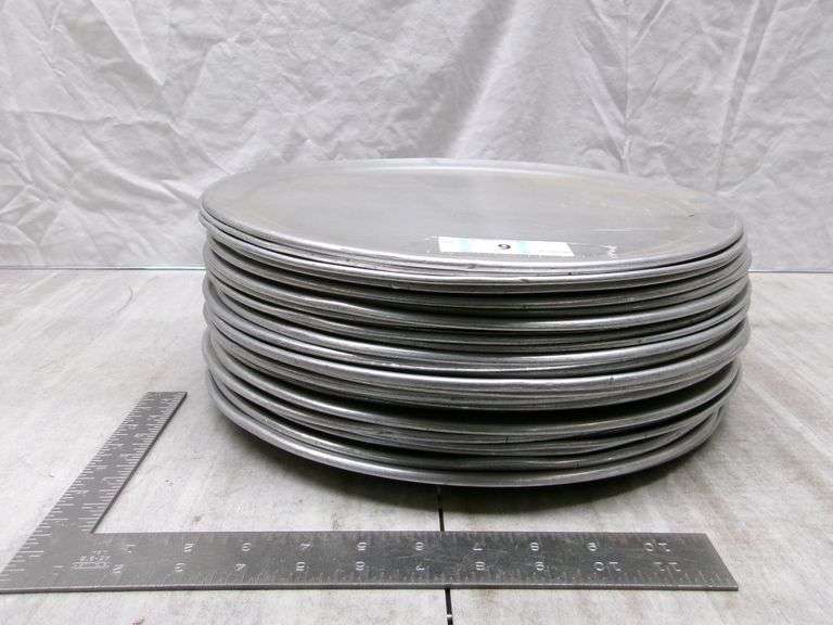 STACK OF SILVER PIZZA PANS QTY 24