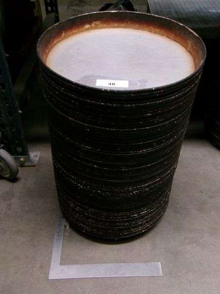 STACK OF LARGE STOVE DRUM COVERS, 50 QTY