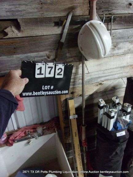 LOT: HARD HAT, YARD STICK, LEVEL, CLOSET AUGERS, KNIFE, TIRE PRESSURE GAUGE