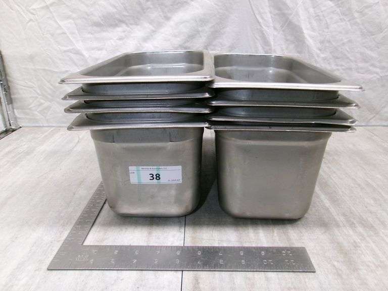 STACK OF STAINLESS STEEL PANS