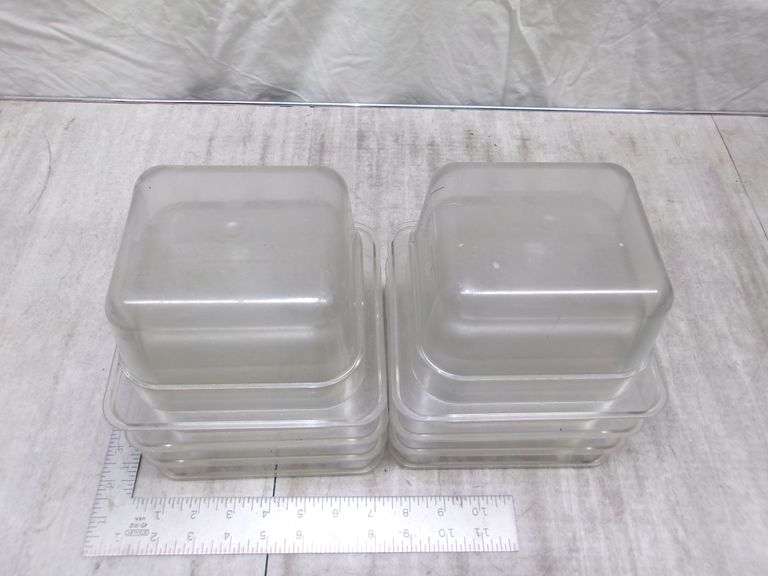 STACK OF 8 PLASTIC SMALL FOOD CONTAINERS