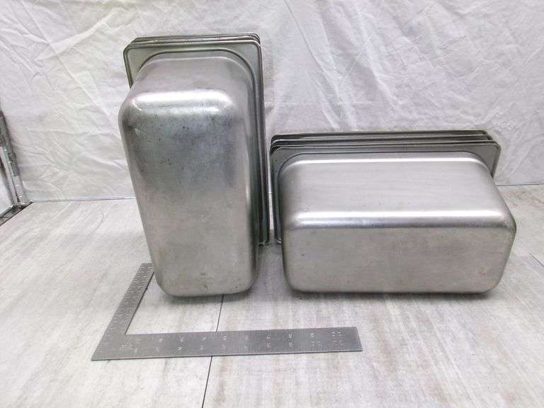 STACK OF STAINLESS STEEL PANS