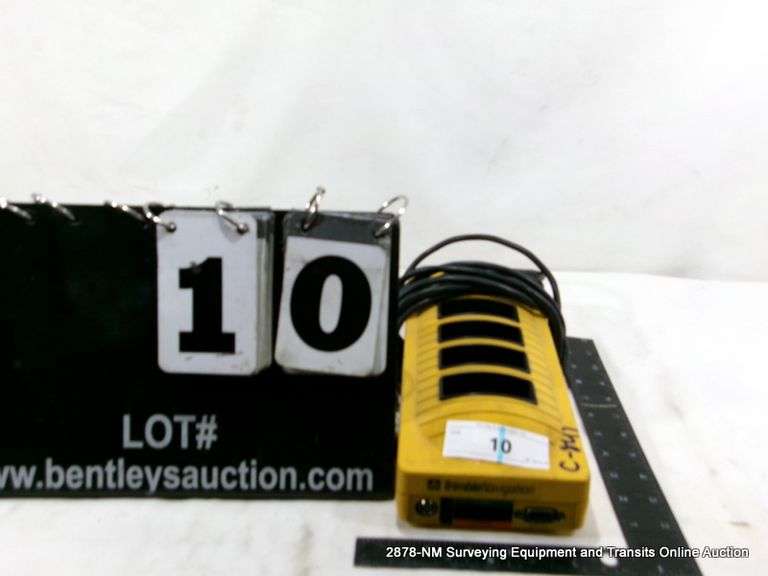 TRIMBLE MODEL 20669-XX 4 SLOT BATTERY CHARGER CLOCK