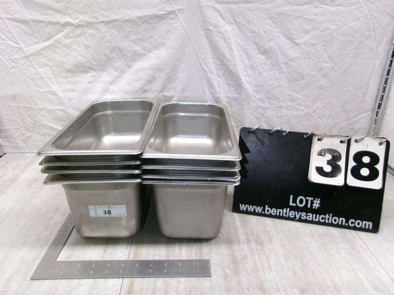 STACK OF STAINLESS STEEL PANS