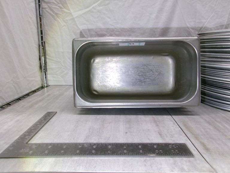 6-STAINLESS STEEL FOOD PANS, STACK OF 42 PIZZA PANS