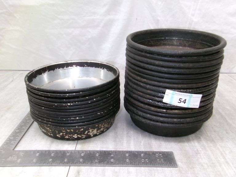 STACK OF SMALL STOVE DRUM COVERS, 27 QTY