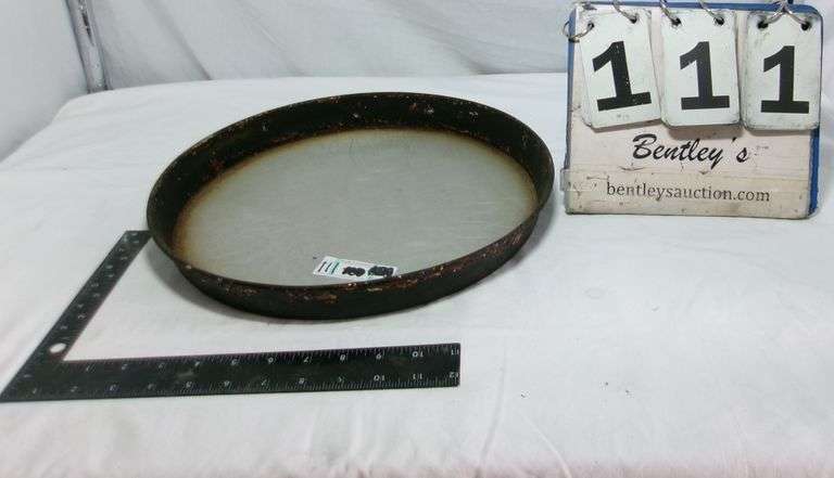 STACK OF LARGE STOVE DRUM COVERS