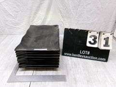 STACK OF BLACK PLASTIC PLATES, QTY 9