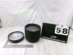 STACK OF SMALL STOVE DRUM COVERS