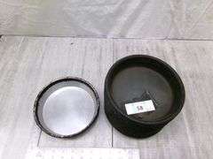 STACK OF SMALL STOVE DRUM COVERS