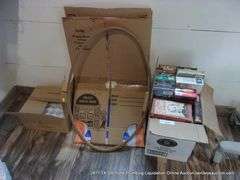 BOX: VARIOUS VHS TAPES & LARGE EMBROIDERY HOOP