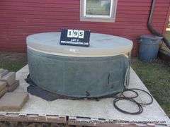 LOT: ROUND HOT TUB W/ COVER, PALLET PLATFORM AND STEPPING STONES