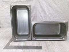 STACK OF STAINLESS STEEL PANS