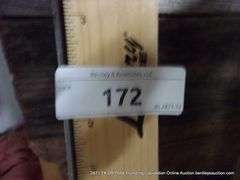 LOT: HARD HAT, YARD STICK, LEVEL, CLOSET AUGERS, KNIFE, TIRE PRESSURE GAUGE