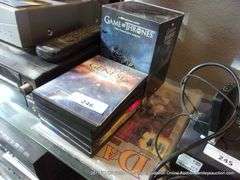 LOT: (1) BOOK & (1) LOT DVD'S