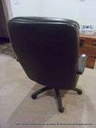 BLACK ROLL AROUND DESK CHAIR