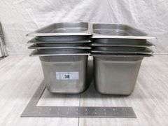 STACK OF STAINLESS STEEL PANS