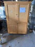 WOODEN 4-DOOR CABINET ON WHEELS