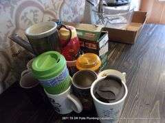 LOT: DRINKING & COFFEE CUPS, JERKY GUN