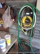 LOT: WALL HANGING ITEMS - CORDS COPPER, JUMPER CABLES