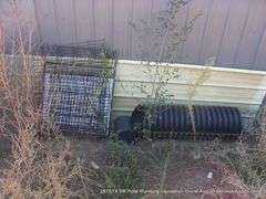 LOT: SCHUTZ WATER STORAGE, CROP FENCING, SIDING, WHITE & GREEN PIPES W/ HOLES