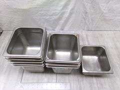 STACK OF SMALL STAINLESS STEEL PANS, 9 QTY