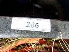 LOT: BLACK TUB W/ HOSES AND SPRINKLER