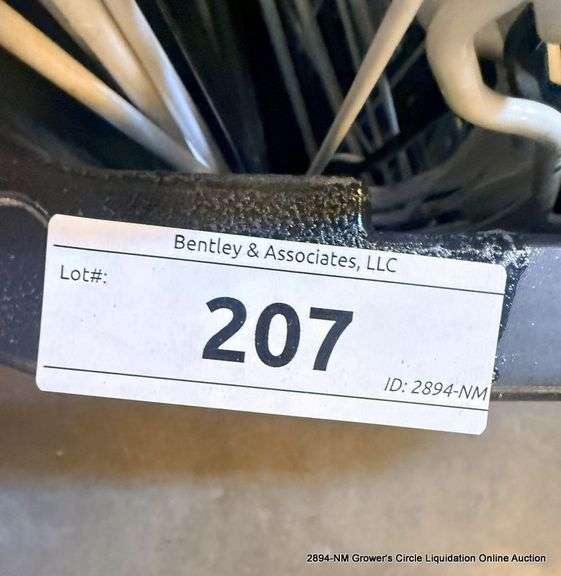 BLACK TOTE FULL OF HANGERS