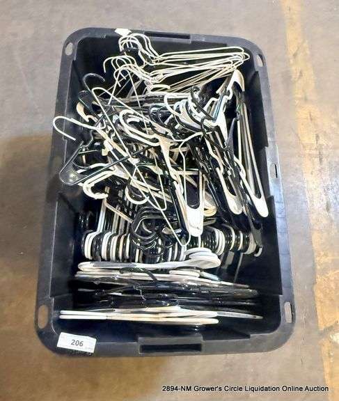 BLACK TOTE FULL OF HANGERS