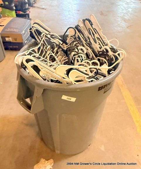 LARGE TRASH BIN FULL OF HANGERS